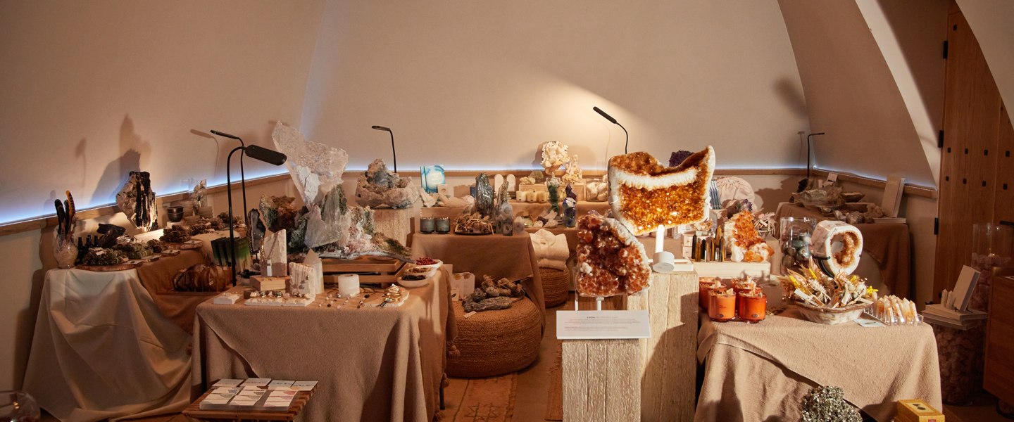 Crystals and specimens laid out across linen-covered tables in the Dome.